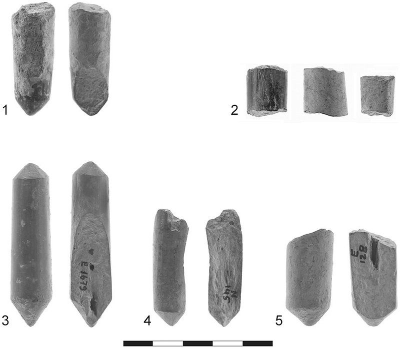 Close-up of the clay cylinders showing wear and striations